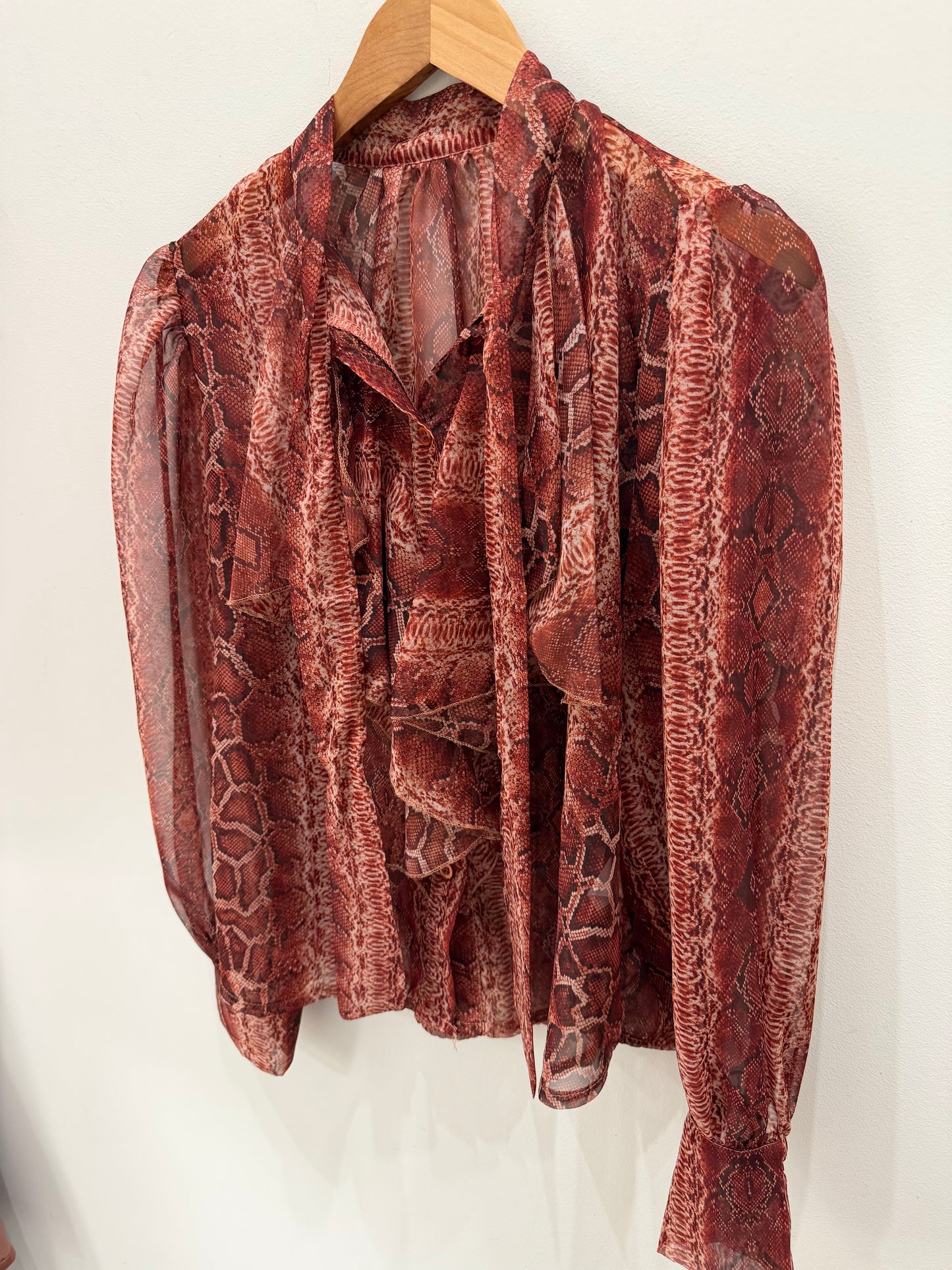 BLUSA SERPIENTE TRANPARENTE