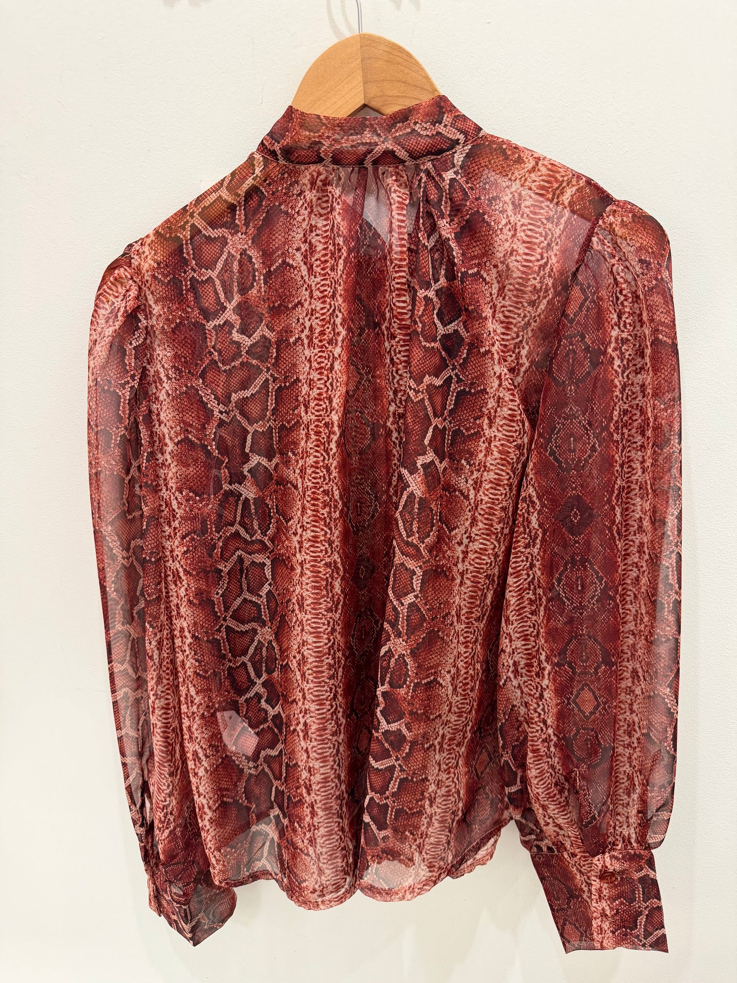 BLUSA SERPIENTE TRANPARENTE