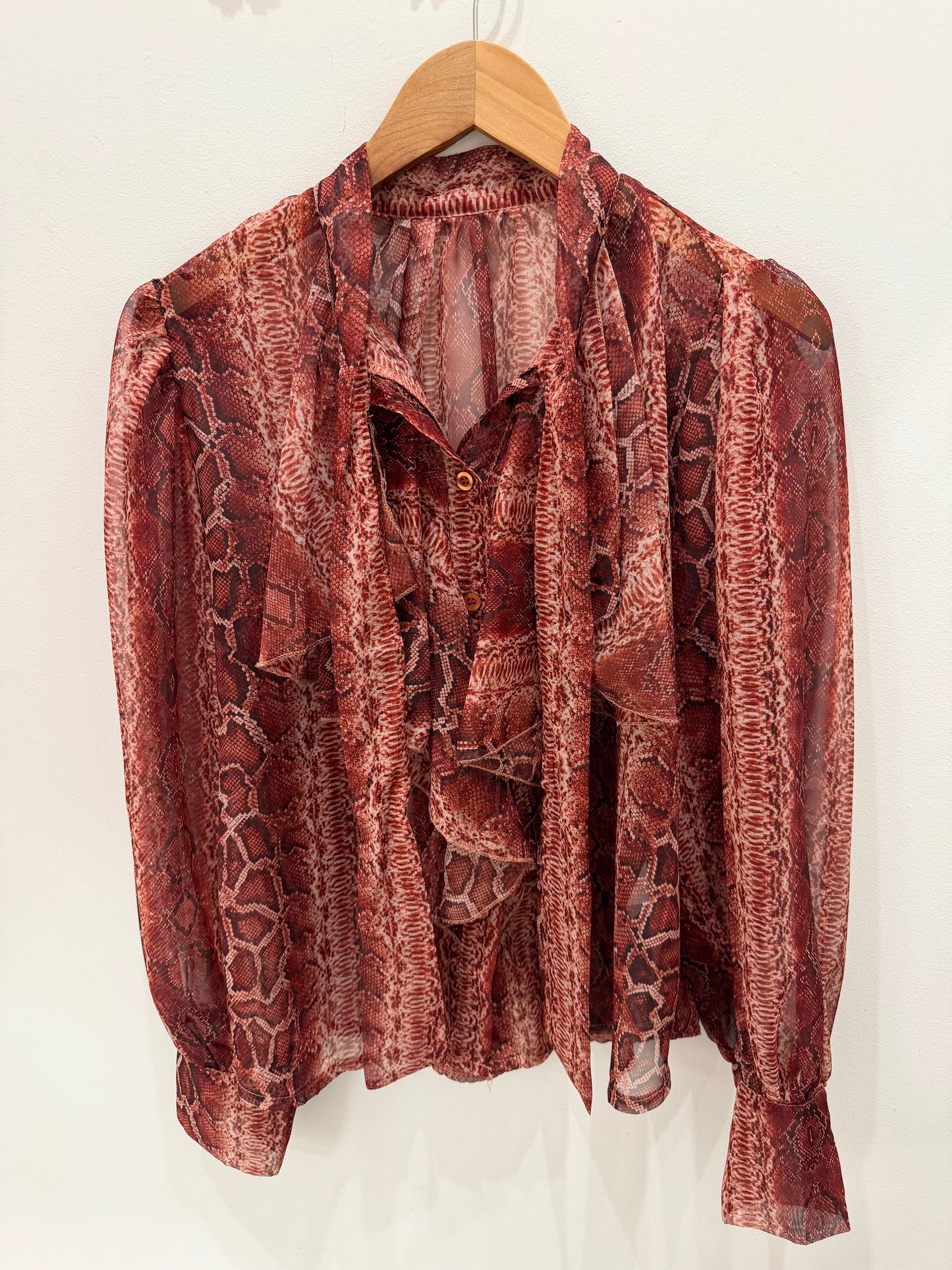 BLUSA SERPIENTE TRANPARENTE