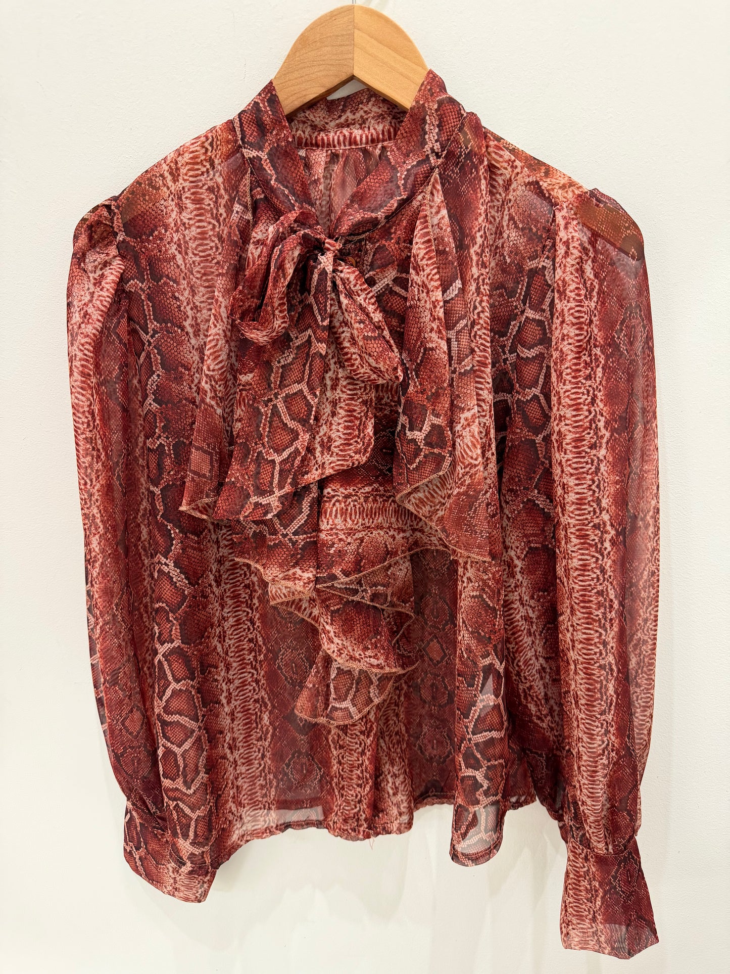 BLUSA SERPIENTE TRANPARENTE