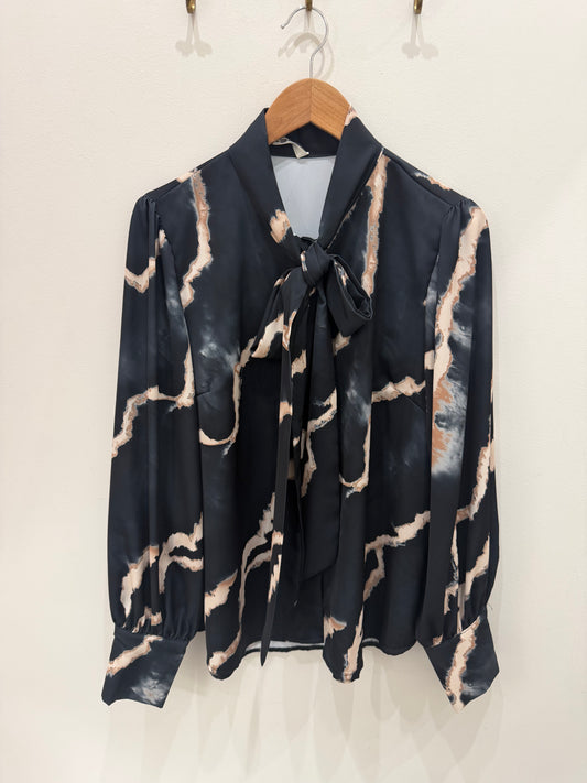 BLUSA FLUIDA ESTAMPADA