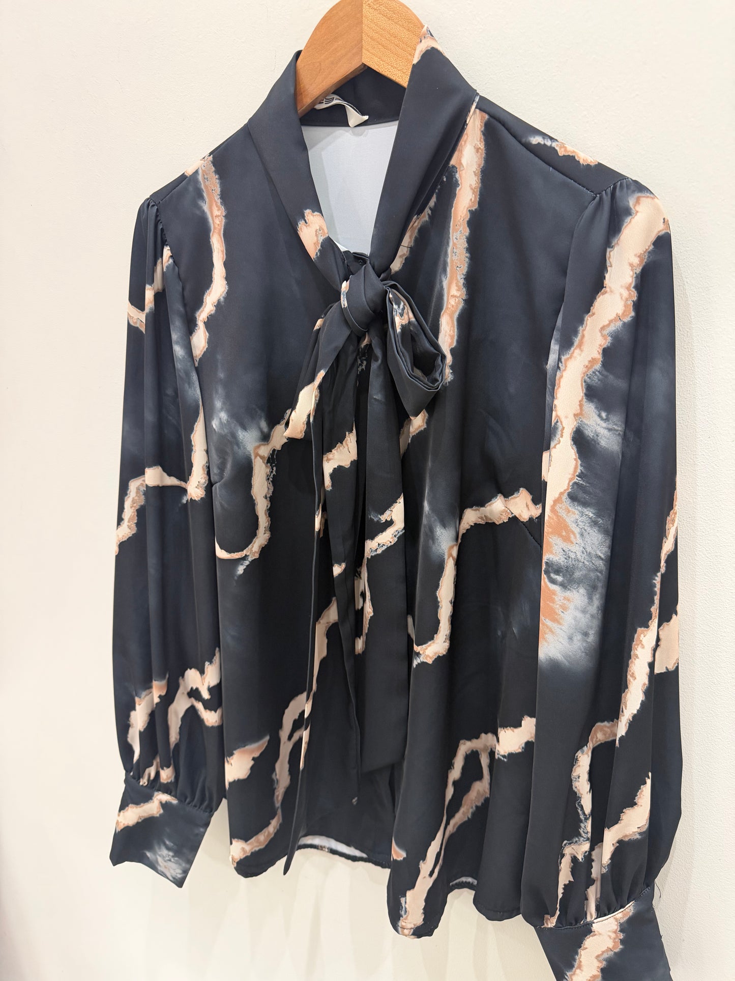 BLUSA FLUIDA ESTAMPADA
