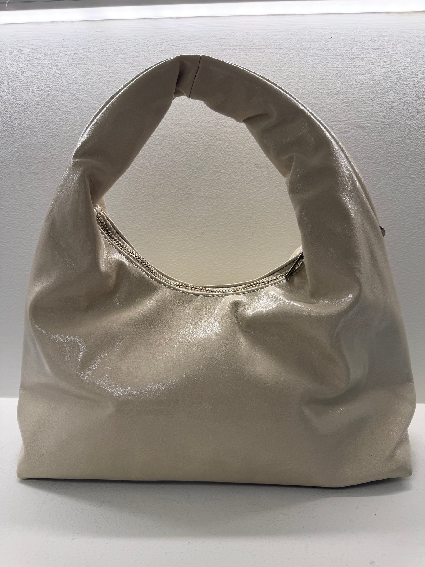 BOLSO BEIGE ARANDELAS